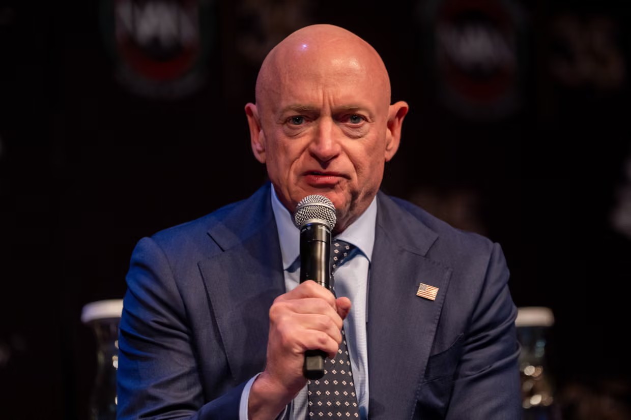 Mark Kelly speaks at the National Action Network’s annual convention on 11 April 2026 in New York City. Photograph: David Dee Delgado/Getty Images