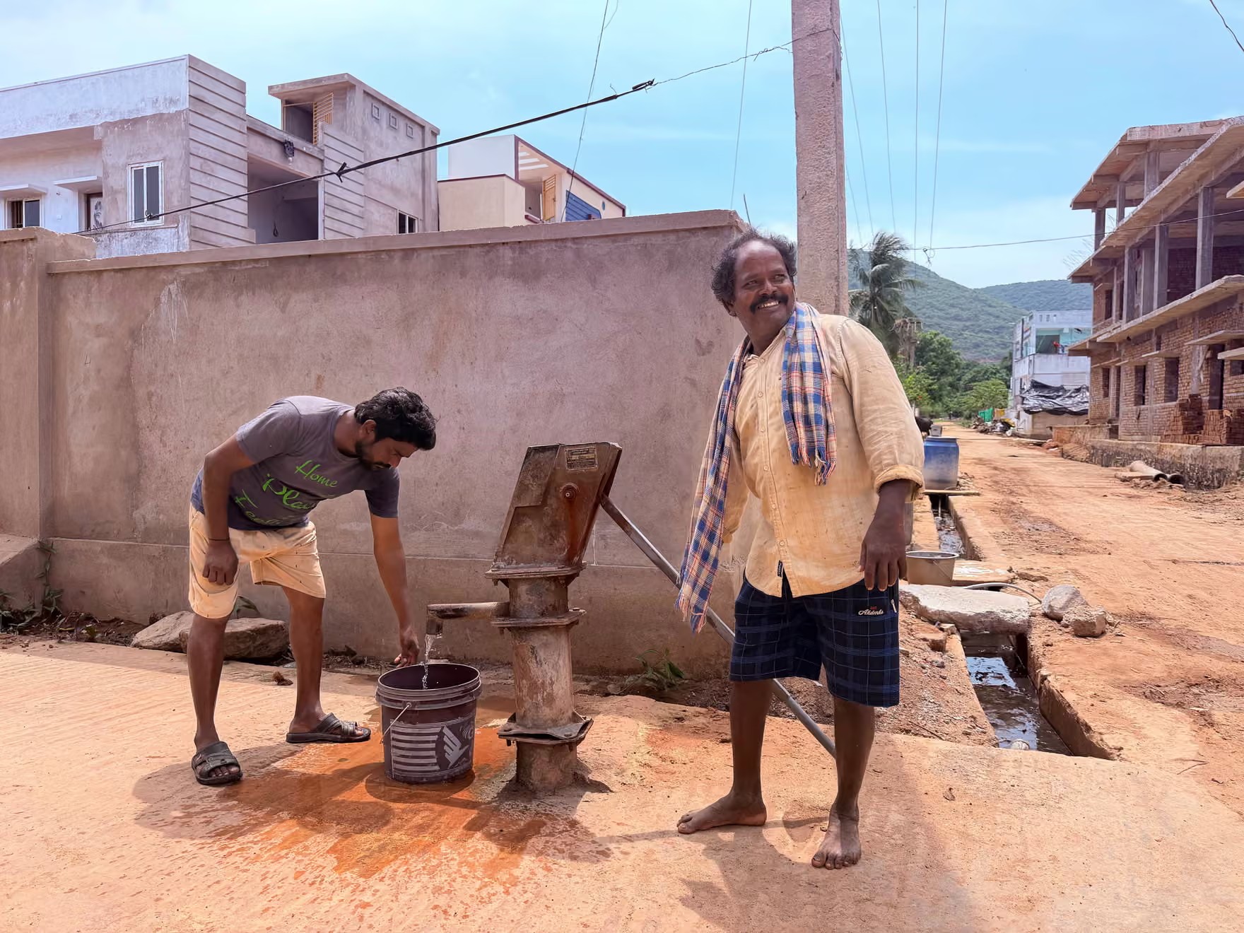 P Venkat Rao, a Dalit farmer, pumps water in the village. He was forced to give up his land for the Google datacentre and now has no livelihood. Photograph: Hannah Ellis-Petersen/The Guardian