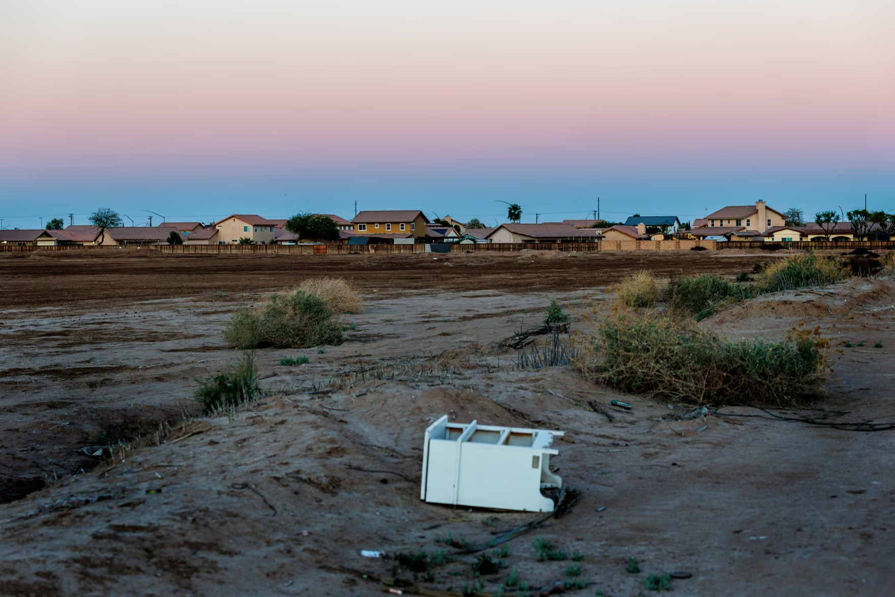 The proposed site of the 950,00 sq ft datacenter is on a dusty parcel next to the Victoria Ranch housing community. Photograph: Gina Ferazzi/Los Angeles Times/Getty Images