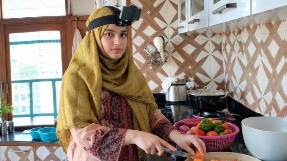 Image caption, Jolly Arifur has been filming domestic work for a few hours a day