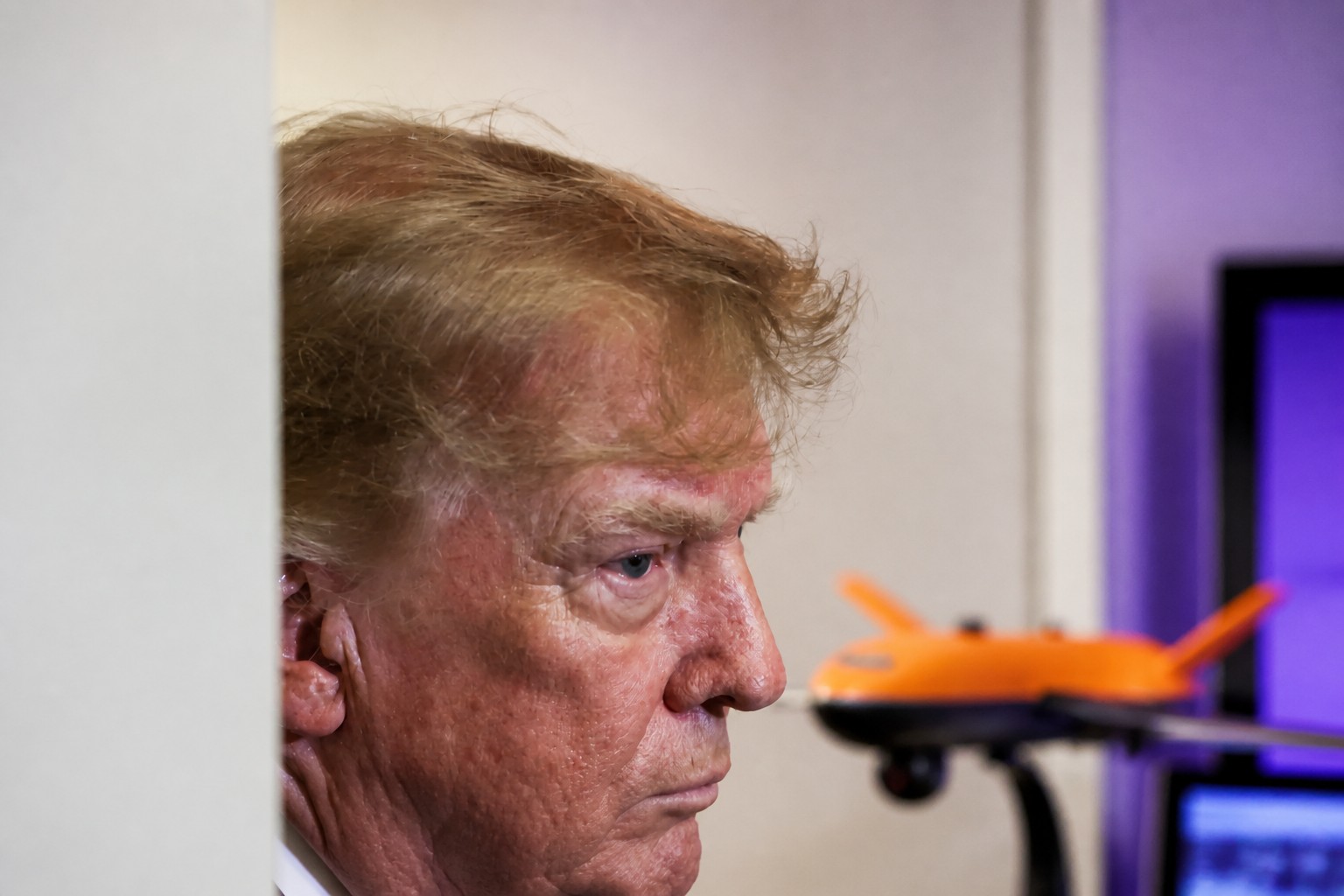 Cover: Trump’s AI push runs alongside a family defense portfolio